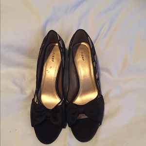 Fioni 2.5 inch heel, black lace dressy shoe.